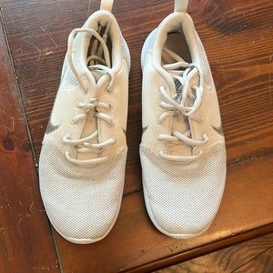 Women’s Nike flex size 7.5. White with slight discoloration (see photos)